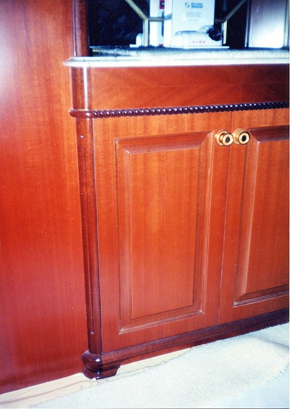 Raised-panel mahogany bar base with beaded trim