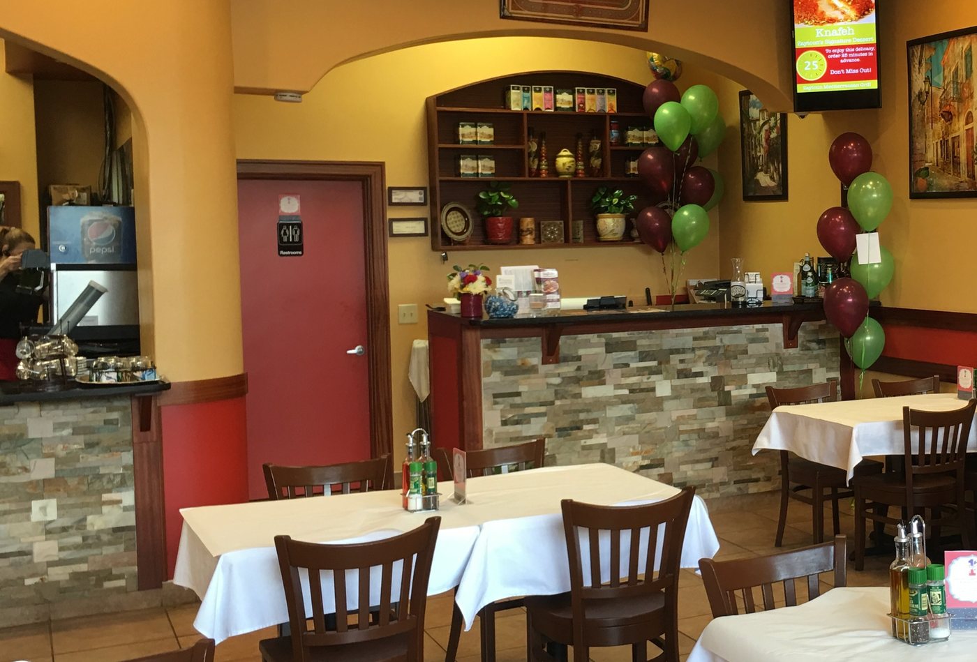 Chair rail and pilaster trim in a restaurant dining room
