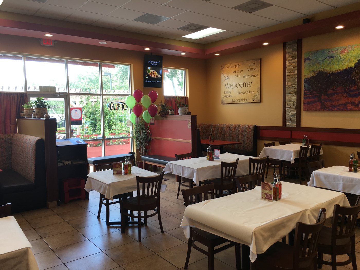 Restaurant dining room with booth surrounds and panelled walls