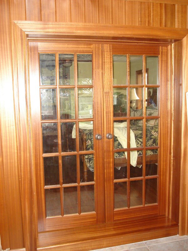 Mahogany French doors with divided glass lights