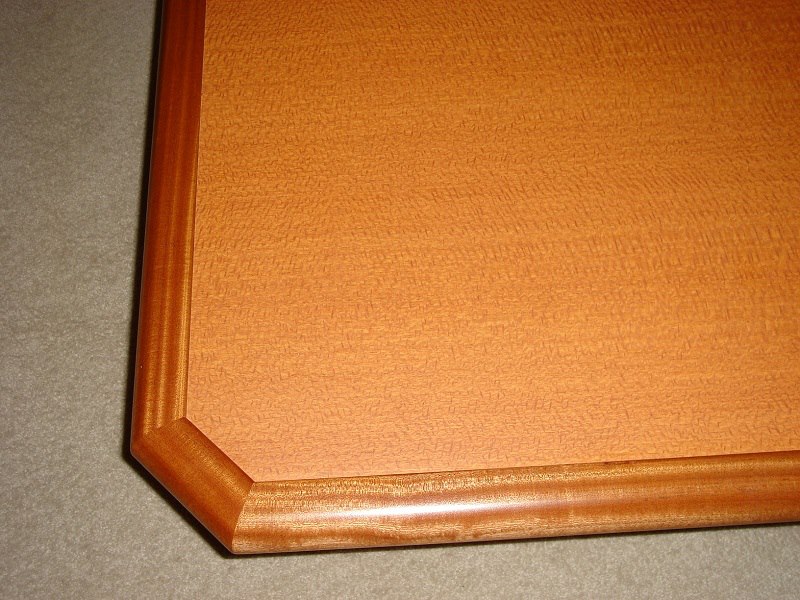 Beveled corner and burl inlay on a custom tabletop