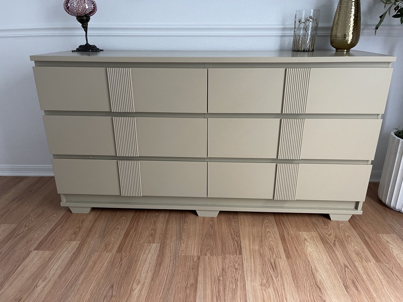 Painted greige dresser with reeded drawer-front panels and tapered feet