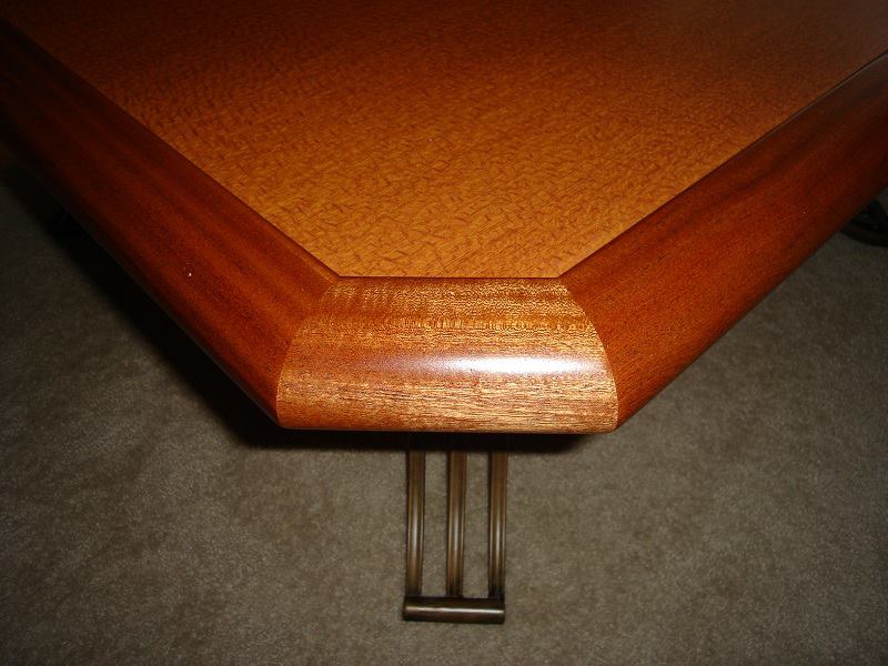 Radiused corner and metal leg on a cocktail table