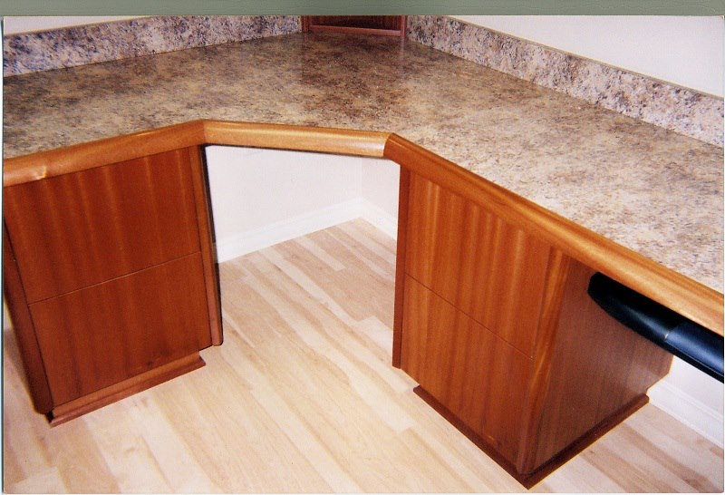 Fitted corner workstation with a stone top