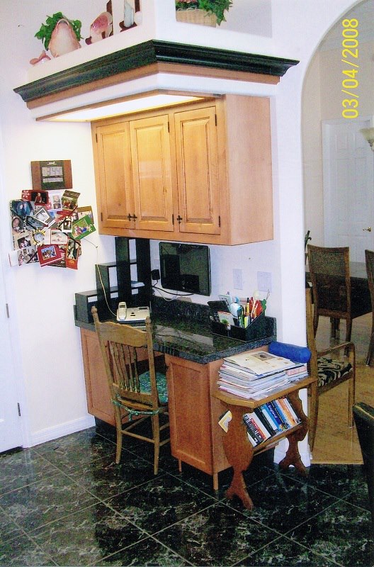 Built-in maple desk nook with granite surface
