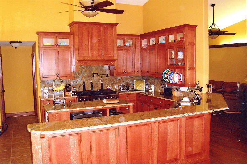Two-tier cherry island with plate rack and under-counter storage