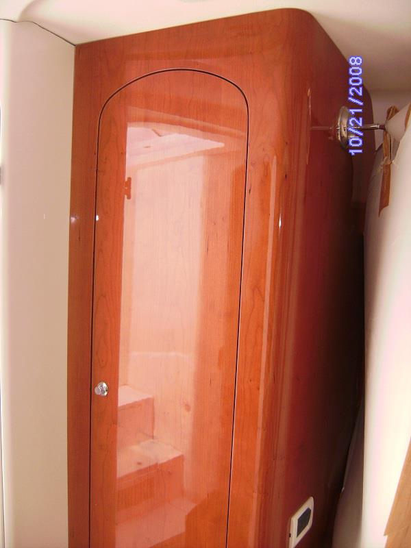 Curved cherry locker door with high-gloss finish
