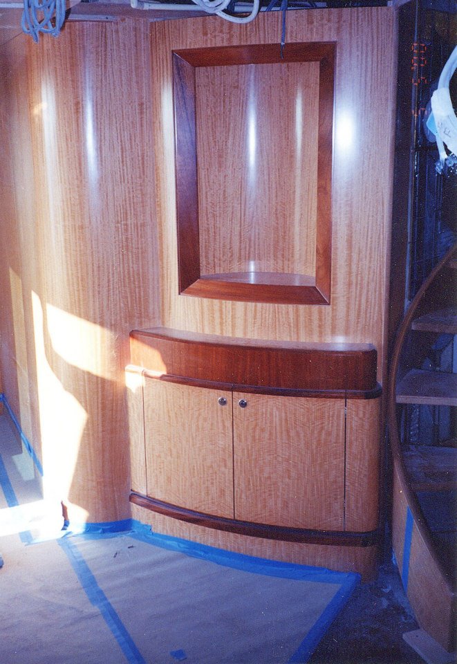 Satinwood cabinet with a recessed mirror niche