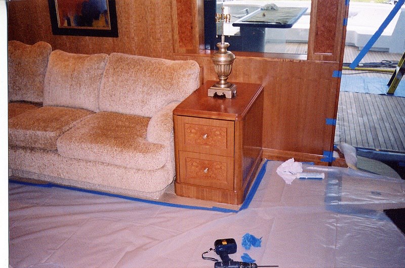 Stateroom cabinetry with matched veneers and nightstand